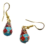 Boucle d'oreille poupee russe