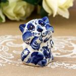 Statuette chat en porcelaine