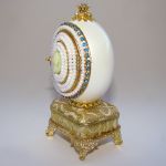 Boite à bijoux oeuf musical en coquille avec camée, inspiration Faberge